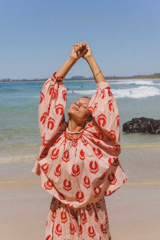Ria Blouse Cherry Blossom — studio full length front view, model wearing cherry blossom pink hand block print cotton blouse, relaxed tie-front style, artisan Jaipur India | Daughters of India