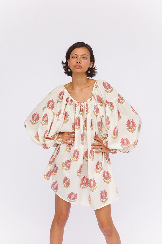 Ria Mini Dress Strawberry Cream — studio full length front view, model wearing strawberry cream floral hand block print cotton mini dress, A-line silhouette with gathered bust and short puff sleeves, artisan Jaipur India | Daughters of India